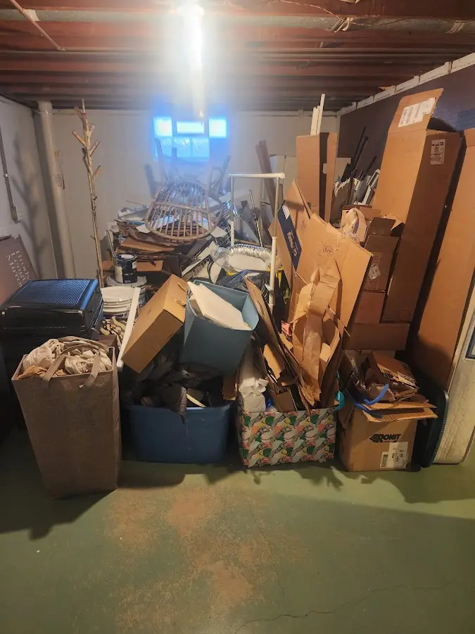 Roll-off dumpster container at job site for Yard Waste Dumpster Rental in Norton